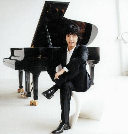 Asian piano player